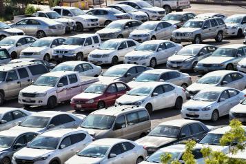 Multiple cars parked in a car park