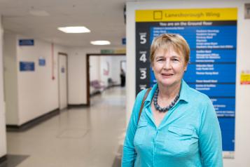 lady smiling at a hospital
